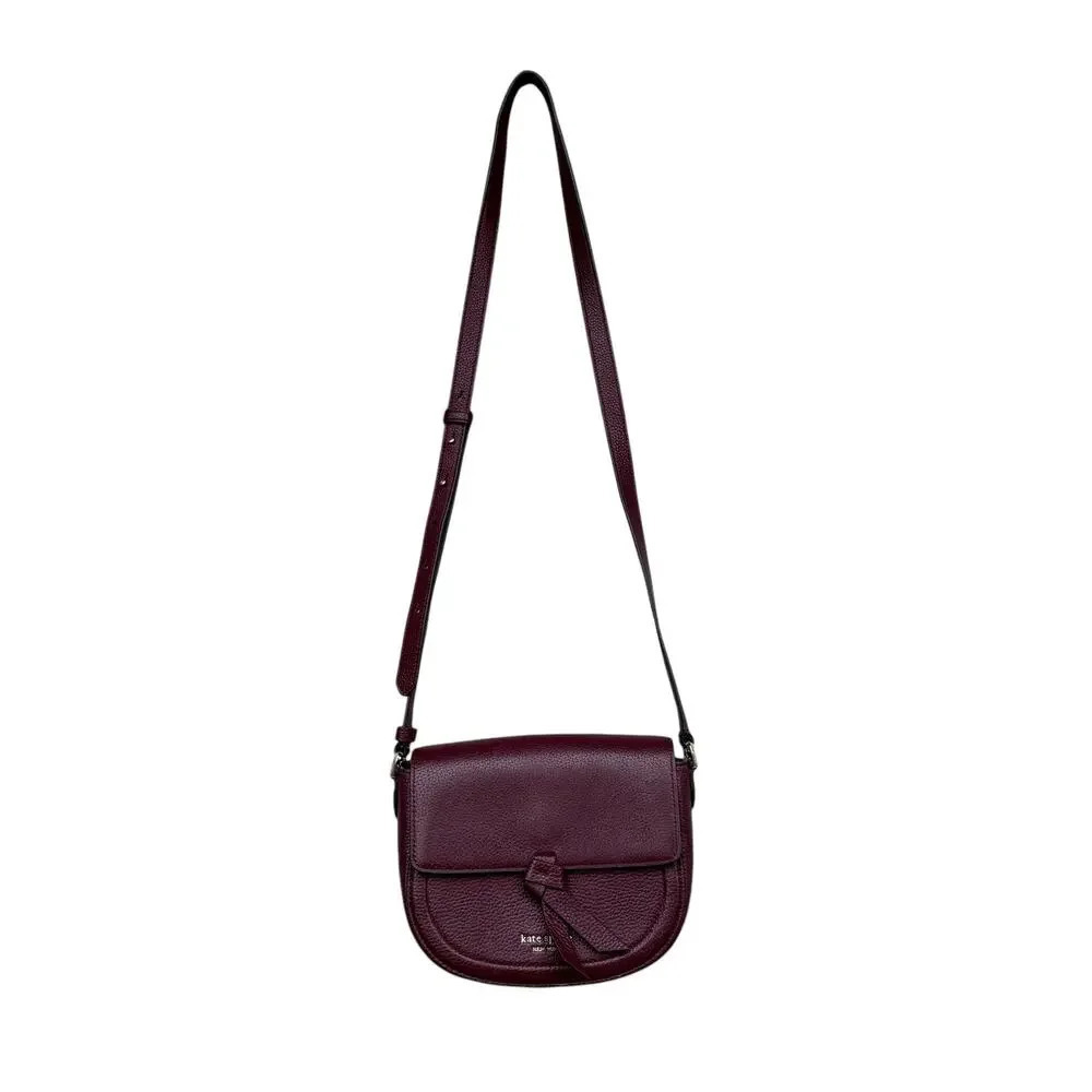 Kate Spade New York Classic Knott Pebbled Leather Medium Saddle Bag in Grenache - Picture 2 of 14